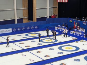 German curlers discuss a shot around the house during the ninth end of a game against Switzerland on the 2026 World Men's Curling Championship on Monday, March 31, 2026, at the Weber County Ice Sheet in Ogden, Utah. (Ryan Olson, Standard-Examiner)
